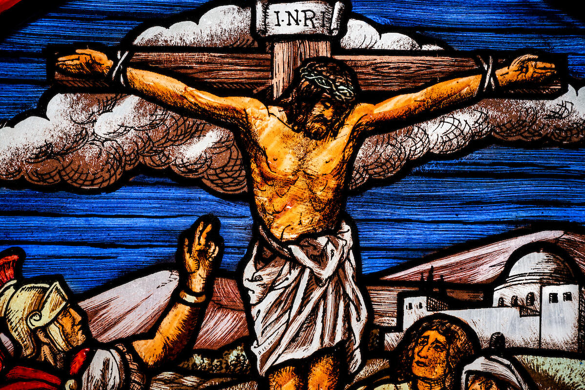 Stained glass depicting the crucifixion of Jesus Christ, on Wednesday, July 27, 2022, at Trinity Lutheran Church, Mobile, Ala. LCMS Communications/Erik M. Lunsford